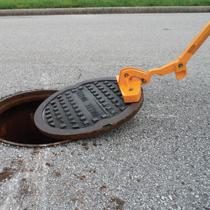 Magnetic manhole lid remover